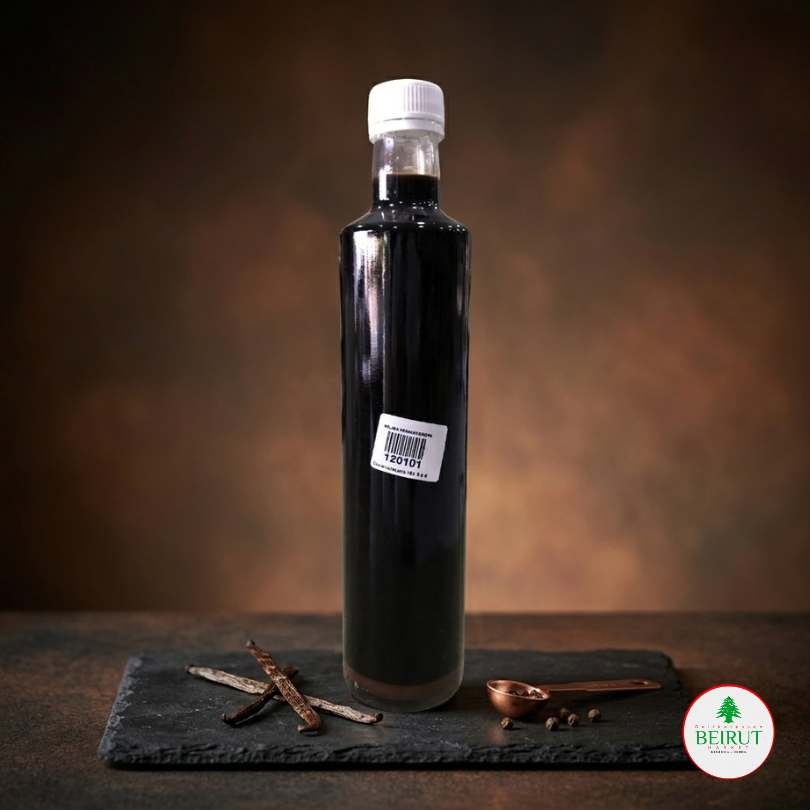 Botella alta de cristal con extracto de vainilla negra de 500ml y tapa blanca