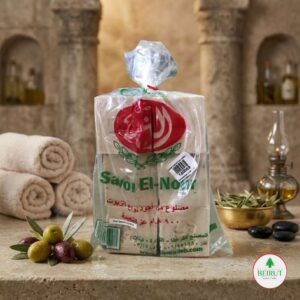 Paquete transparente de 900 gramos de jabones artesanales Savon El-Nour con logotipo rojo y verde.