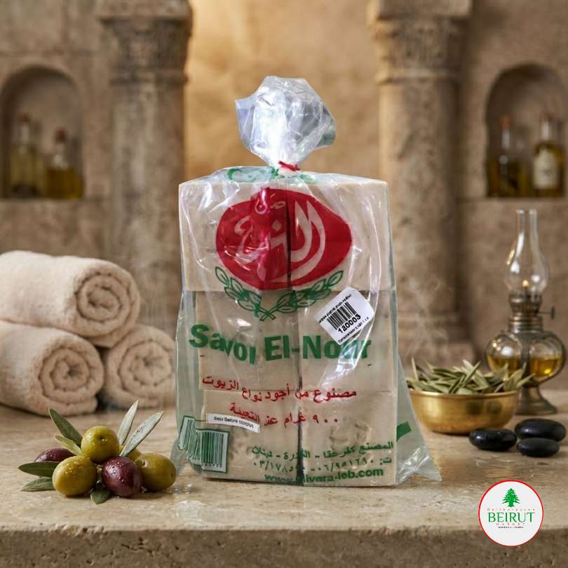 Paquete transparente de 900 gramos de jabones artesanales Savon El-Nour con logotipo rojo y verde.