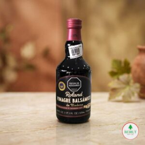 Botella de cristal oscuro de Vinagre Balsámico de Módena Roland de 500ml, con etiqueta negra y sellos de certificación IGP