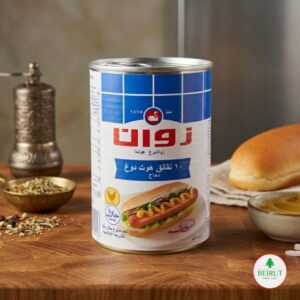 Lata de Hot Dogs de pollo marca Zwan con etiqueta azul y blanca, destacando el logotipo de la marca y una imagen de un perro caliente