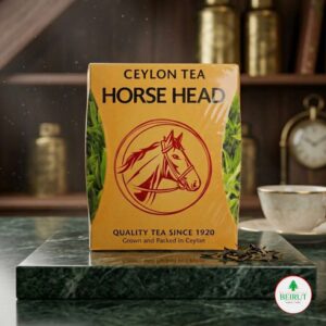 Empaque de Té de Ceilán Horse Head de color amarillo con el logotipo icónico de una cabeza de caballo roja